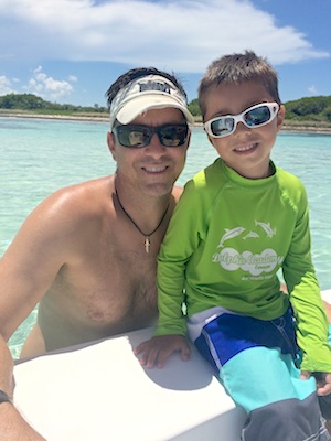 Ben with oldest son Kye for a day on the water. 